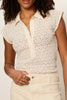 lacey polo top with a half button front and classic collar 