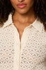 lacey polo top with a half button front and classic collar 