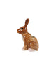 ceramic vase in the shape of a brown rabbit