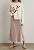 cream colored sweater with a cute knit flying duck knit graphic