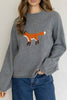 heather grey sweater with a knit fox graphic