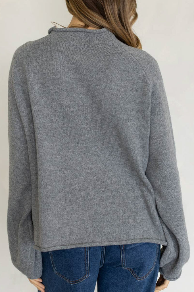 heather grey sweater with a knit fox graphic