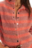 free people peach and pink striped cardigan with a special button front. 