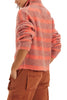 free people peach and pink striped cardigan with a special button front. 