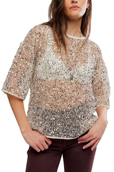 free people dazzling tee with a sequined net fabrication.