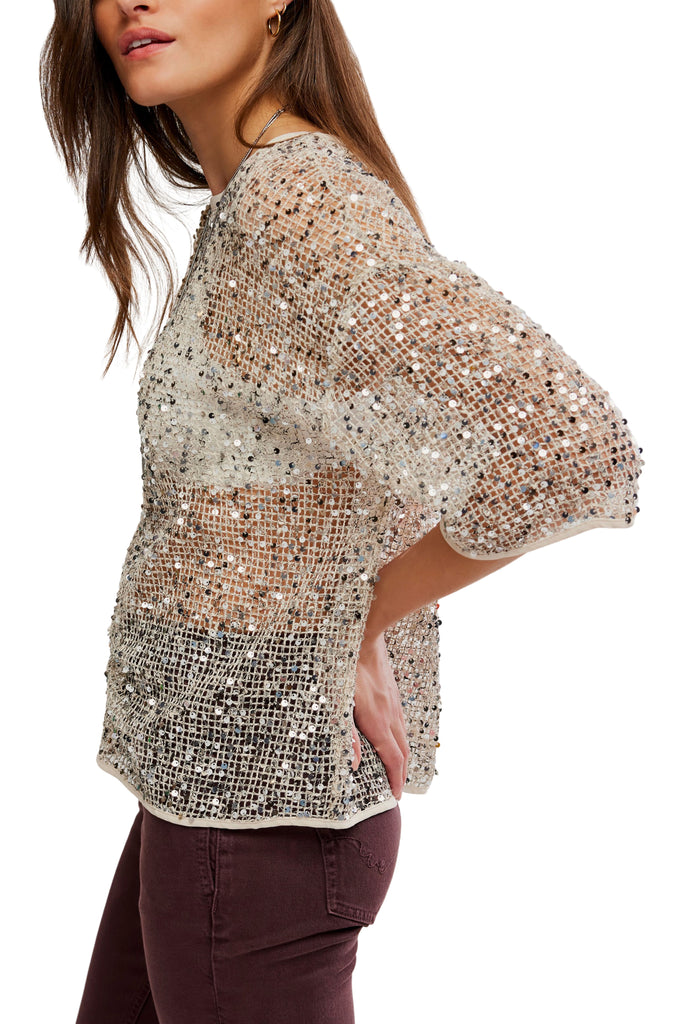 free people dazzling tee with a sequined net fabrication.