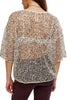 free people dazzling tee with a sequined net fabrication.