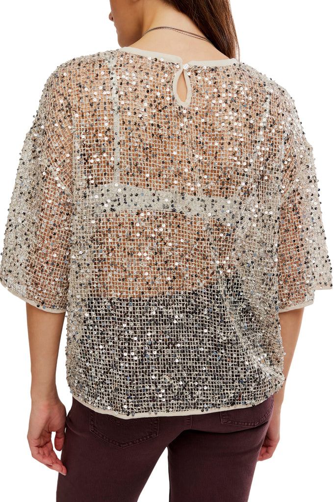 free people dazzling tee with a sequined net fabrication.