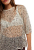 free people dazzling tee with a sequined net fabrication.