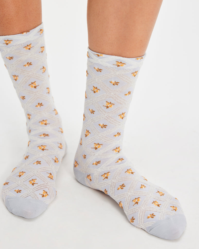 floral jacquard trouser socks from free people in blue