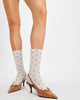 floral jacquard trouser socks from free people in blue