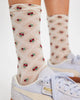 floral jacquard trouser socks from free people in ivory