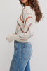 free people fitted white cardigan with a muted plaid design