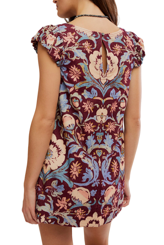 free people mini dress in a colorful paisley printed pattern
