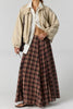 free people preppy and classic maxi skirt in a chocolate brown plaid pattern.