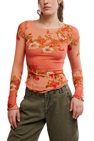 free people mesh long sleeve top in a peachy apricot color with a lovely floral design.