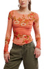 free people mesh long sleeve top in a peachy apricot color with a lovely floral design.