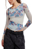 free people mesh long sleeve top in frost blue with a colorful, blue-hued floral design.