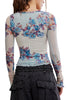 free people mesh long sleeve top in frost blue with a colorful, blue-hued floral design.
