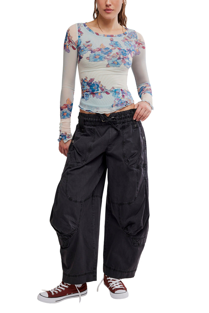free people mesh long sleeve top in frost blue with a colorful, blue-hued floral design.