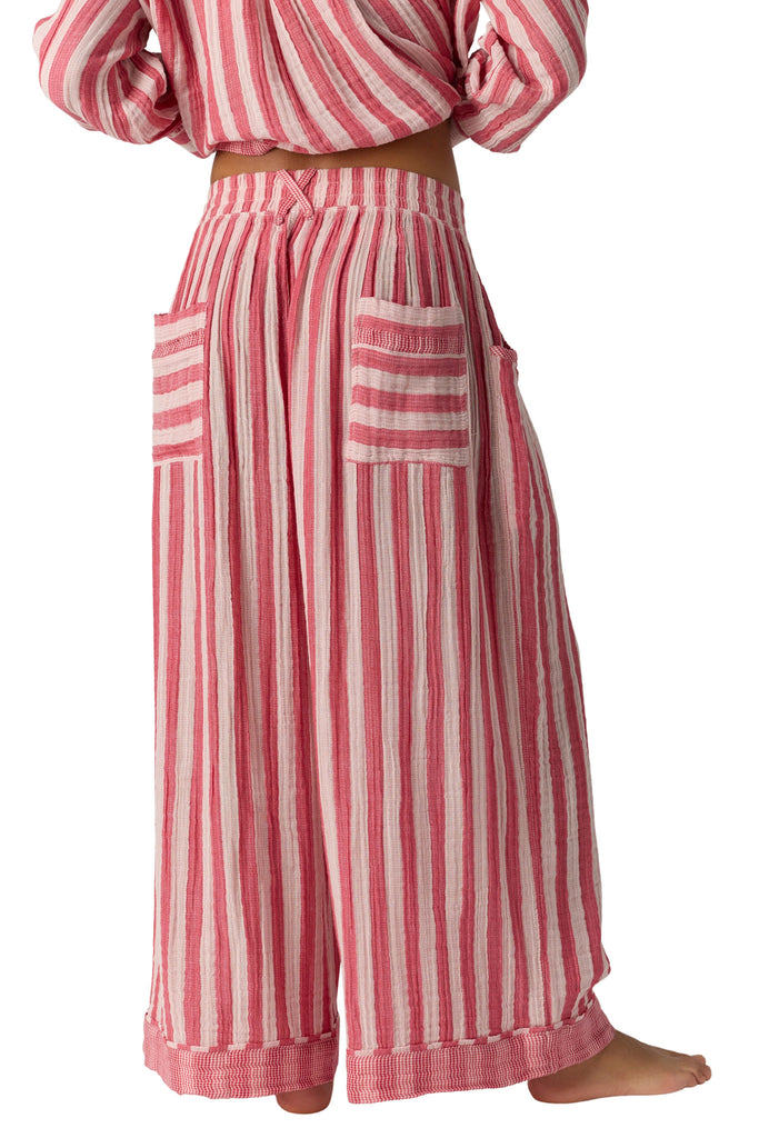free people wide leg pajama pants in berry pink and white stripes. 