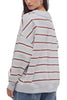 free people oversized pullover in washed sky blue, white, and burgundy stripes.