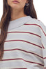 free people oversized pullover in washed sky blue, white, and burgundy stripes.