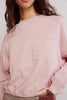 free people long sleeve top in peachy pink