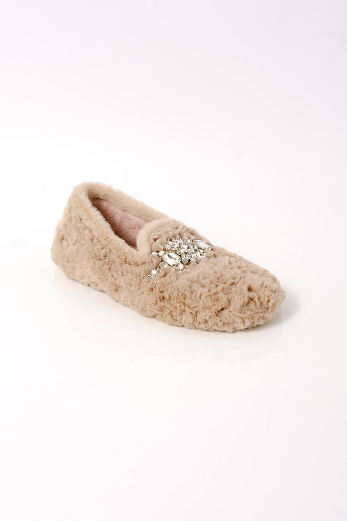 free people fuzzy slippers with a loafer shape and rhinestone detailing