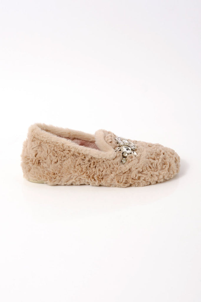 free people fuzzy slippers with a loafer shape and rhinestone detailing