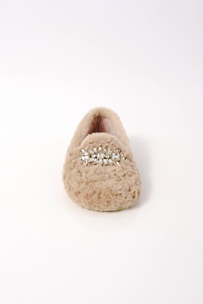free people fuzzy slippers with a loafer shape and rhinestone detailing