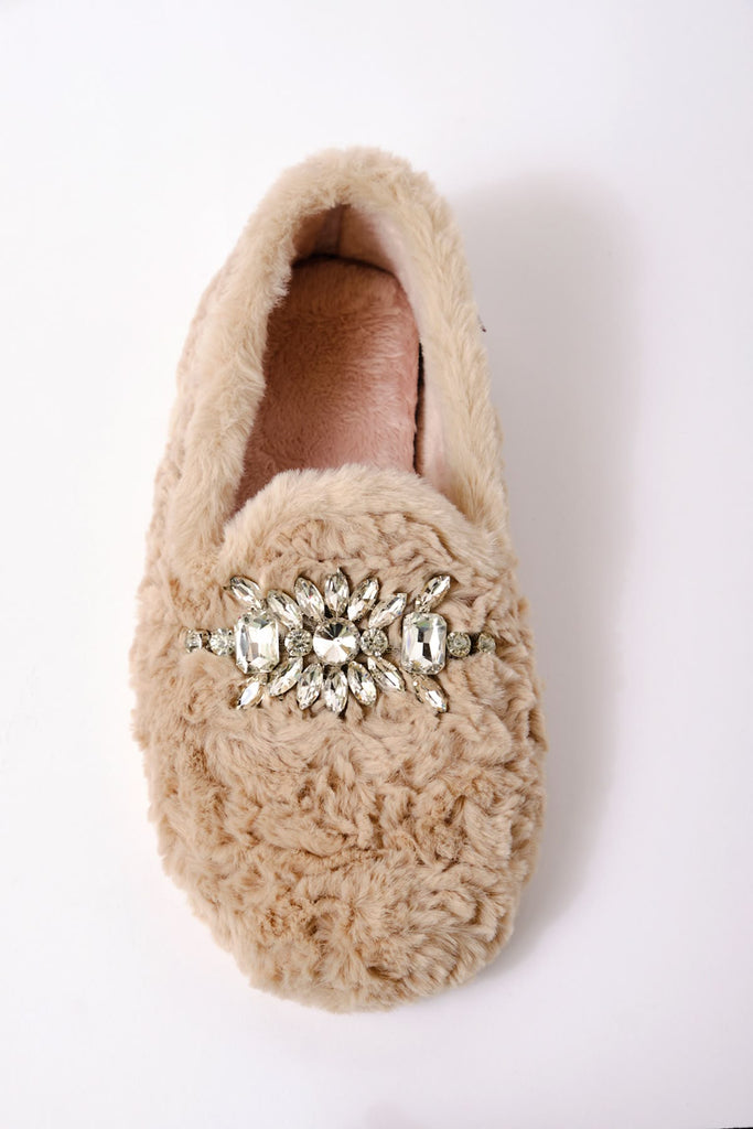 free people fuzzy slippers with a loafer shape and rhinestone detailing