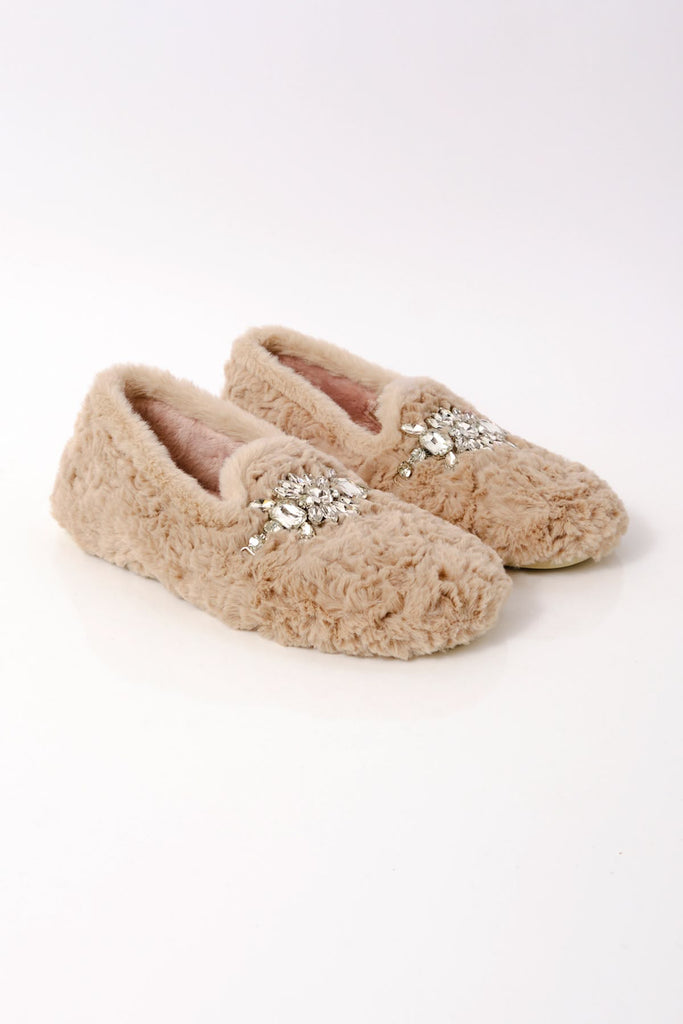 free people fuzzy slippers with a loafer shape and rhinestone detailing