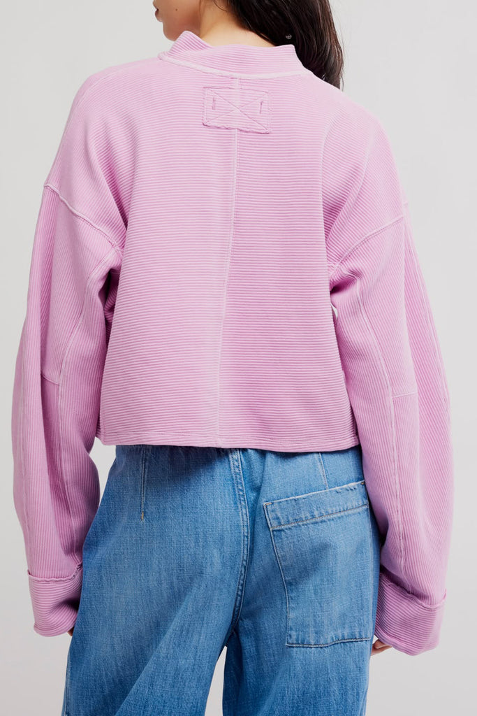 free people soft cotton pullover in pretty purple-hued light pink. 