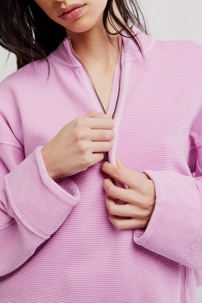 free people soft cotton pullover in pretty purple-hued light pink. 