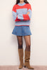 chunky knit sweater in fiery coral and pale periwinkle blue stripes. 