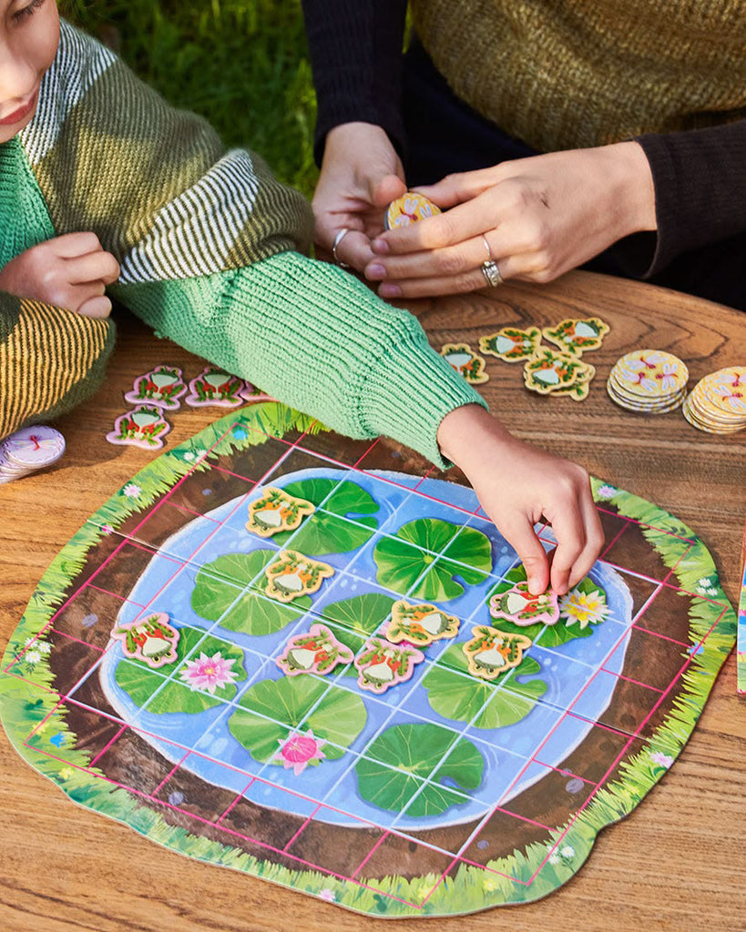 frog hopkins game, a game of strategic hopping