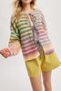 fuzzy front tie sweater in colorful rainbow stripes