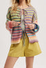 fuzzy front tie sweater in colorful rainbow stripes