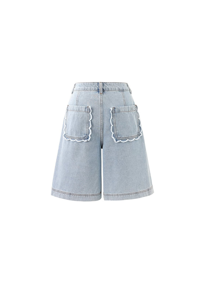 scalloped trim on back pockets and frnch logo embroidery