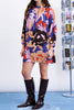 striking mini dress in a brightly colored floral pattern