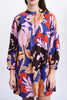 striking mini dress in a brightly colored floral pattern