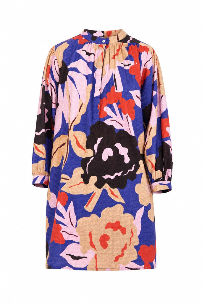striking mini dress in a brightly colored floral pattern