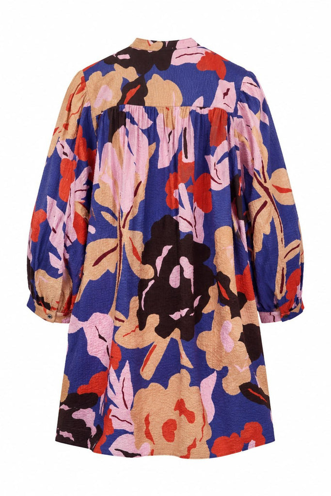 striking mini dress in a brightly colored floral pattern