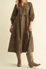 roomy midi dress in a fierce leopard print with contrasting red trim throughout
