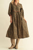 roomy midi dress in a fierce leopard print with contrasting red trim throughout