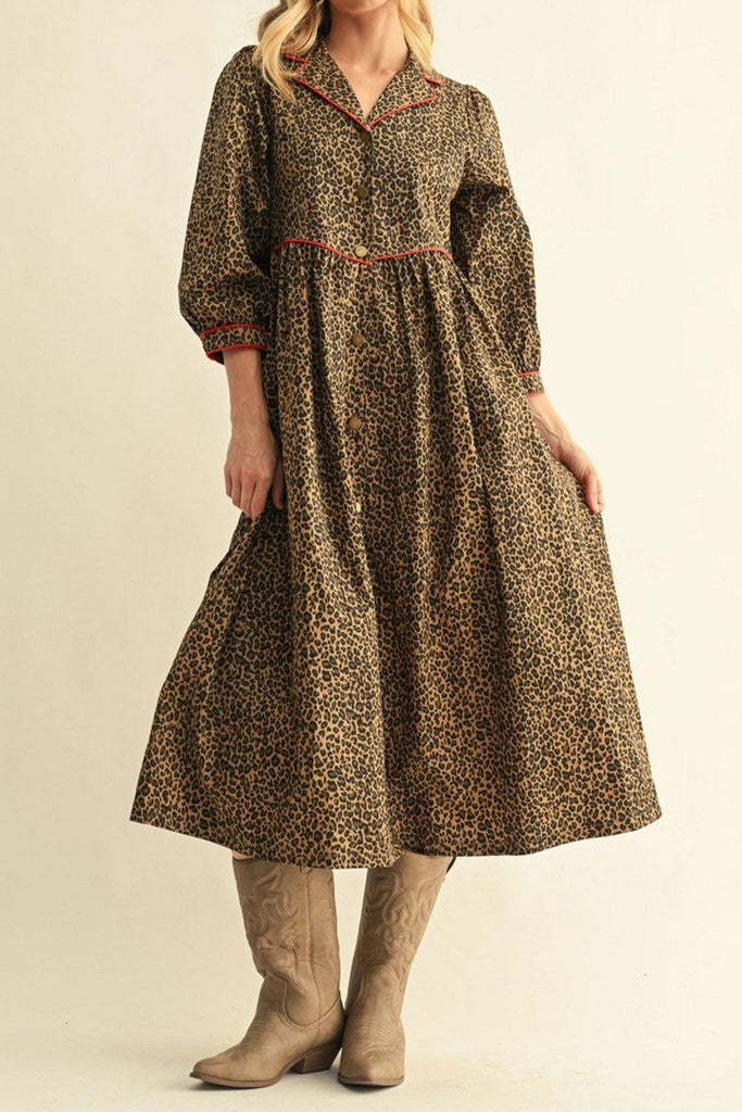 roomy midi dress in a fierce leopard print with contrasting red trim throughout