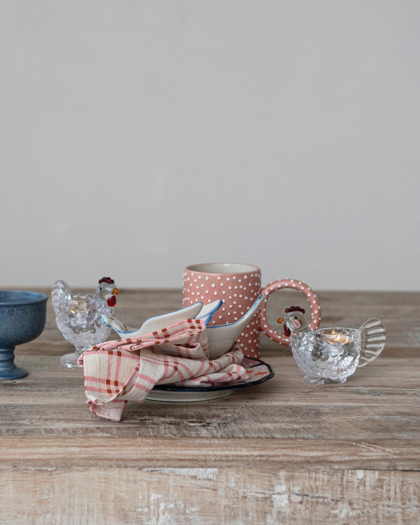 glass votive holder in the shape of a chicken