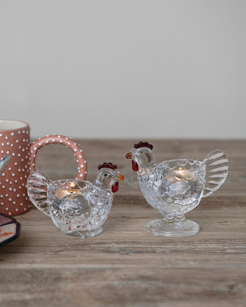 glass votive holder in the shape of a chicken