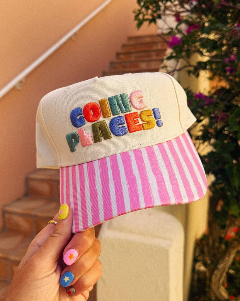 embroidered trucker hat with the message "going places!"